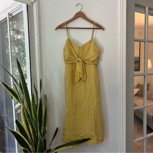 Yellow and white striped linen midi dress with front tie and open back